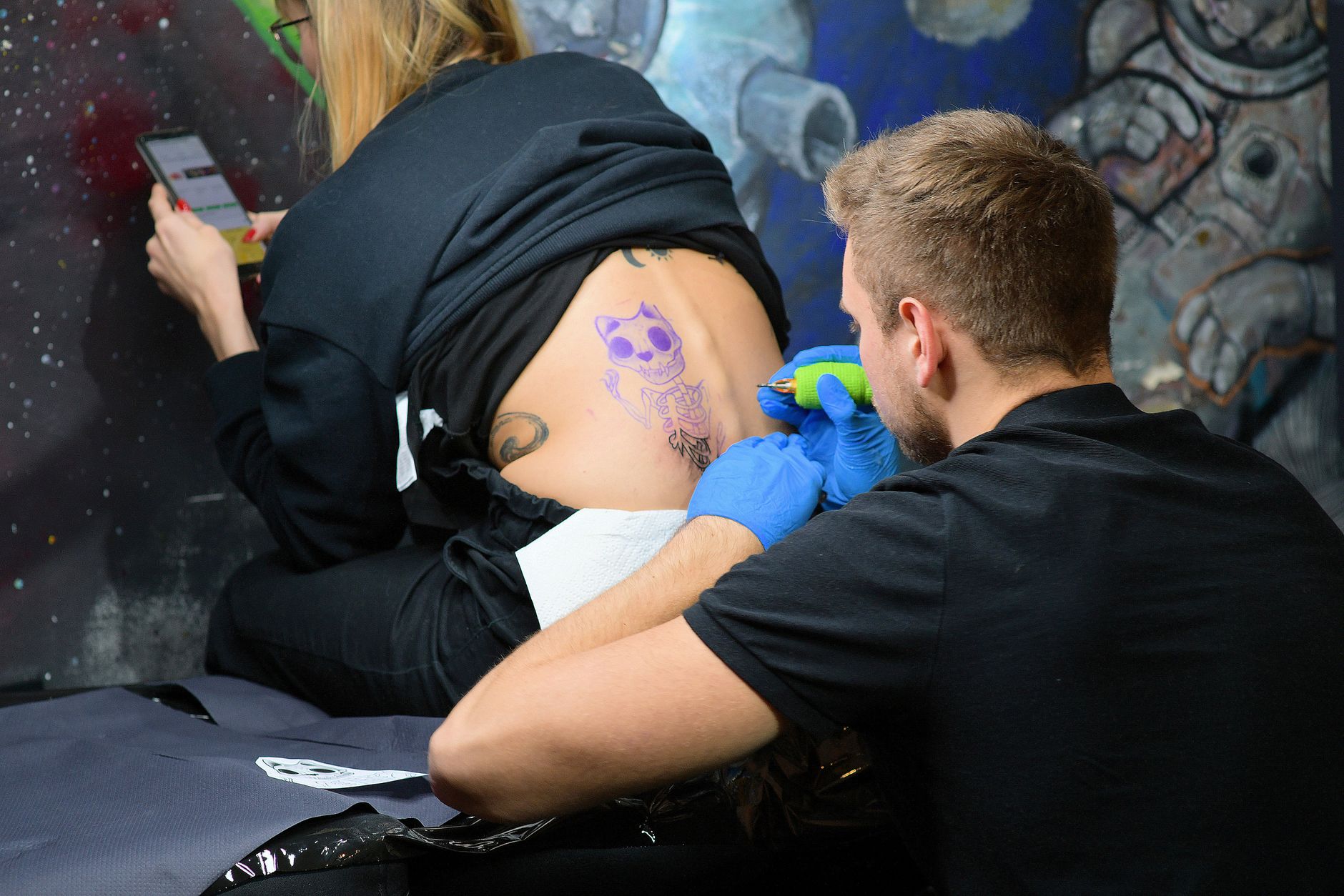 tattoo artist at work